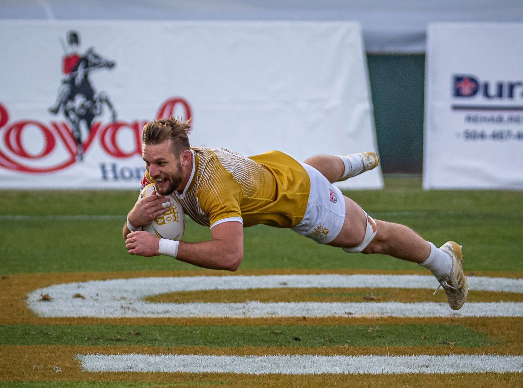 Cam Dolan dives into the try-zone to score the final try in the game against the New England Free Jacks.